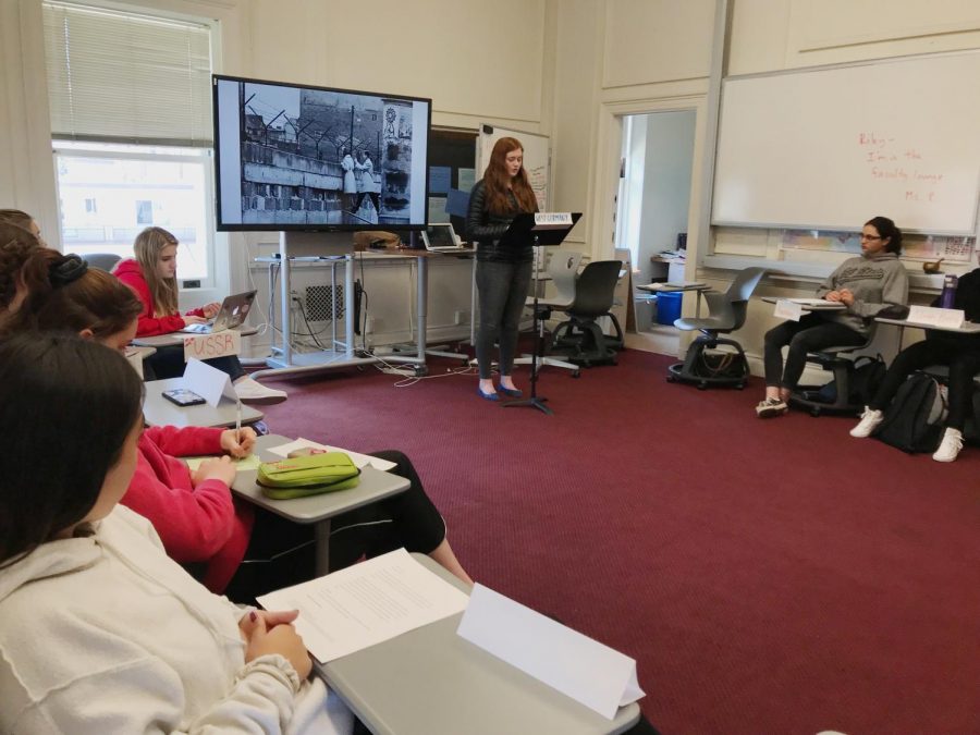 Sophomore Lauren Tulley represented West Germany in the mock UN conference. Students were required to add a picture to their speech to supplement their performance.