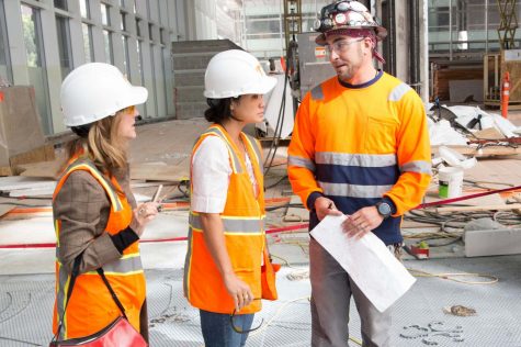 Former art teacher Julie Chang oversees the installation of the 23,000 square foot terrazzo
floor she designed for the Grand Hall of the new Salesforce Transit Center. Chang’s piece is one of four public artworks created for the Transit Center.