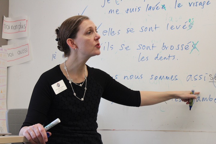Head of School Rachel Simpson substitutes in a French class in 2017 for a teacher on leave. Simpson was named this morning the 2018 Administrator of the Year by the Journalism Education Association.