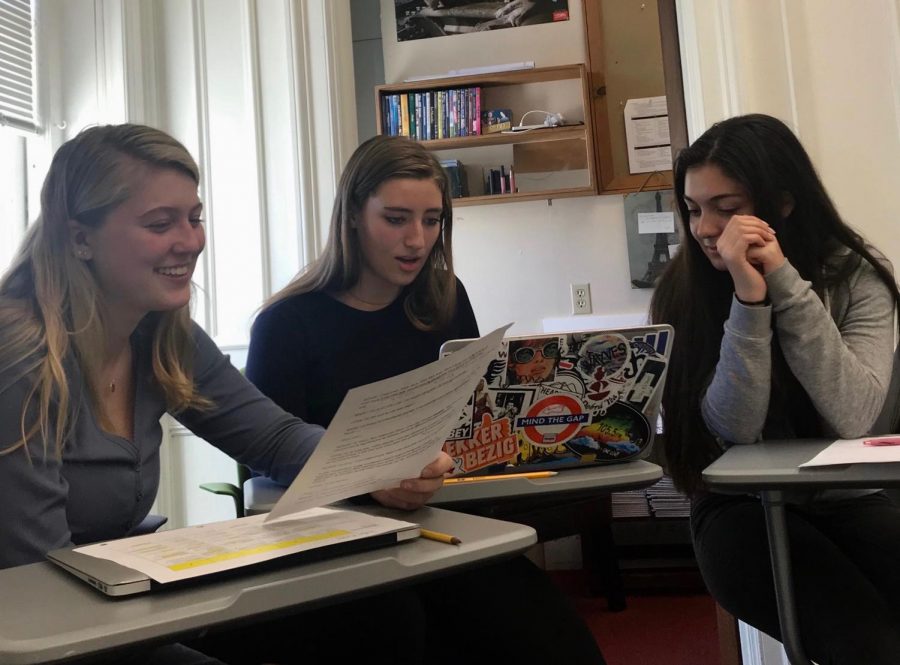 Seniors Jordan Russell, Caroline Phillips, and Laura Bourne read through their script. Students received edits on their work.