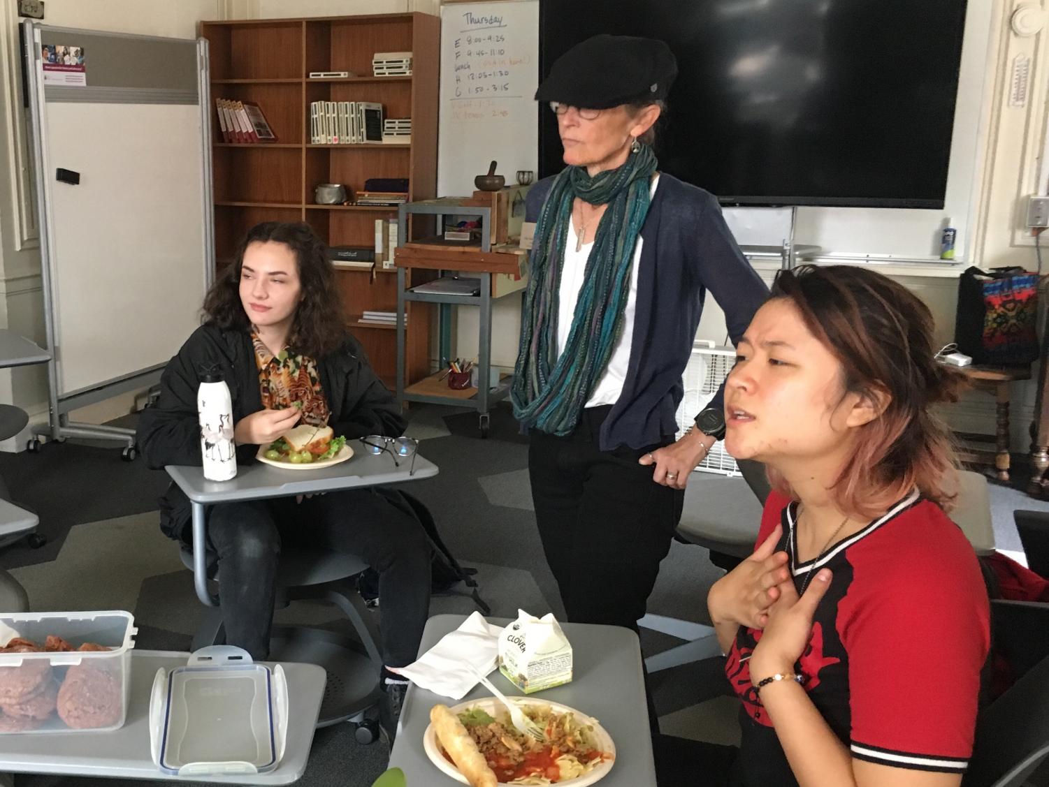 Club head Darrean Loy leads a discussion on LGBT+ representation in media during a Gender and Sexuality Awareness Club meeting. Club members enjoyed homemade Nutella cookies during the discussion.