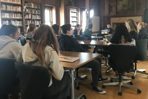 Seniors work in college counseling class. Seniors are required to attend college counseling on Monday or Tuesday of each week.