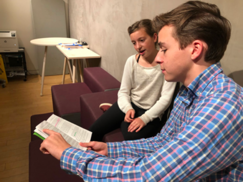 Assistant Director Trip Gorman runs lines with seventh grader Amelia Alton during a weekday rehearsal. High schoolers worked as stage managers, choreographers, and costume designers.