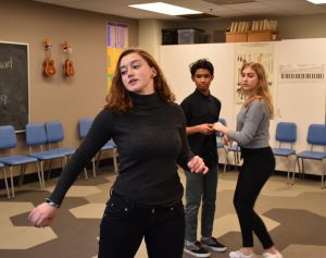 Choreographer Delaney Tobin rehearses numbers with the musical cast for the spring
show of ”Loves Labours Lost” that ran last week. Tobin choreographed over 15 numbers for the show.