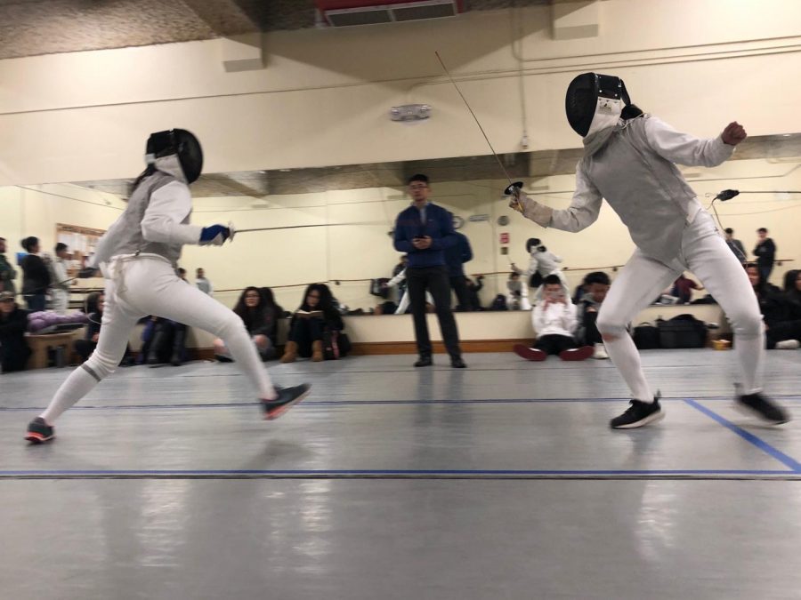 Senior Kelly Chan lunges for the opportunity to hit her opponent in a match against Lowell High School. Convent’s fencing season has a win record of 1-2.