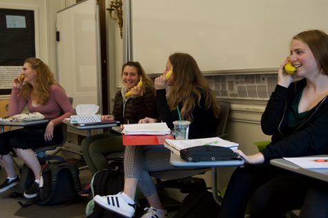 Sophomores ‘speak’ into their banana ‘phones’ as part of a prank on History teacher Michael Stafford organized by English teacher Angelica Allen. The students obtained their bananas before class began to be prepared for the prank. 
