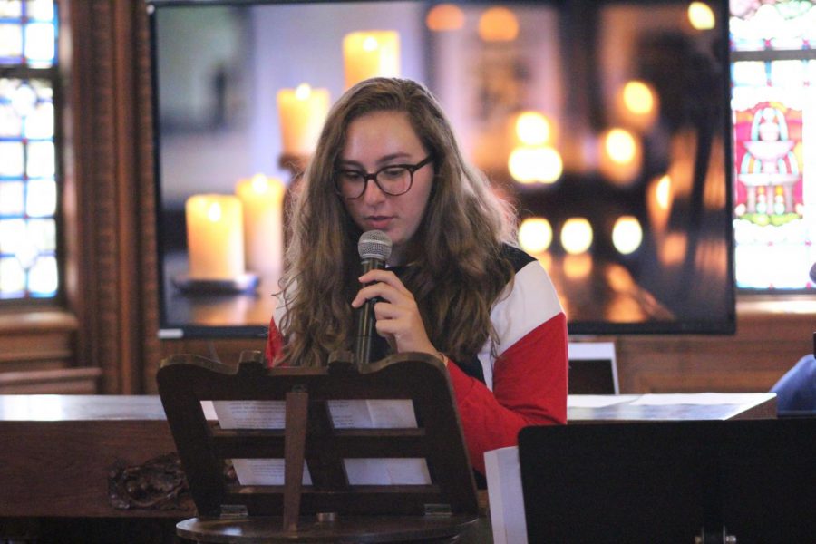 Junior Lili Levy reads a quote from St. Madeline Sophie Barat at the first chapel of the year.
