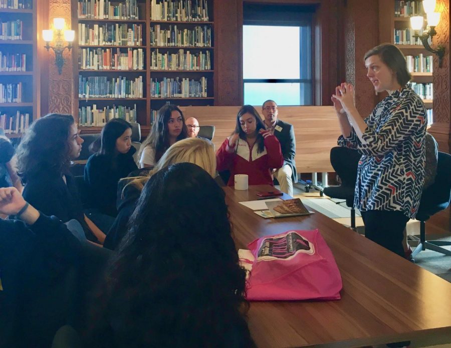 Head of School Rachel Simpson addresses juniors about the importance of CAS. The meeting was held over two days to accommodate the differences in students' location of their A period class. 