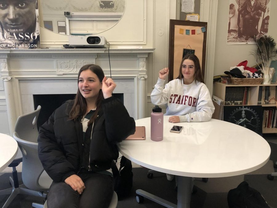 Spanish III students Cristina Jackson and Olivia Williams practice their hand motions and Spanish song for Noels. Their class’s song is called “Tun Tun” and is about Christmas carolers knocking on doors around Christmas time. 