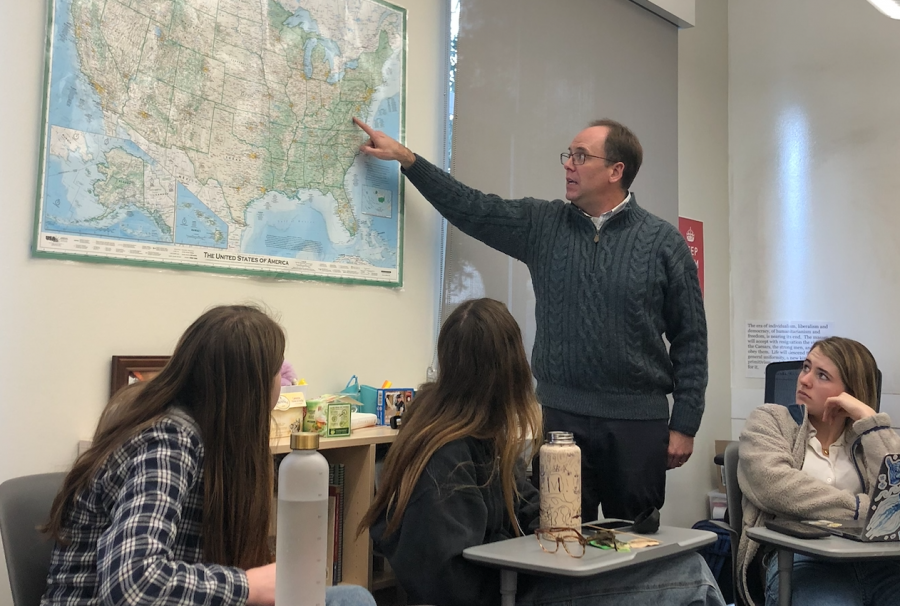 History teacher Michael Stafford points to the different states where the battles occurred. Stafford led a lecture before showing a Ken Burns documentary.
