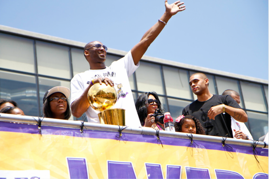 Kobe+Bryant+waves+to+fans+during+the+Los+Angeles+Lakers+2010+Championship+Parade.+Bryant+won+five+NBA+championships+throughout+his+career.