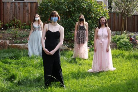 Seniors Estie Seligman, Catherine Webb-Purkis, Brooke Wilson, and Abby Widjanarko celebrate prom outside with masks while social distancing. This is a result of prom being cancelled this year. 