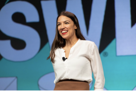 Congresswoman Alexandria Ocasio-Cortez wears her signature bold lip at “South by Southwest” 2019. In her collaboration with Vogue AOC goes over why she chooses to wear this red along with her daily make-up routine and the treatment of women in politics.