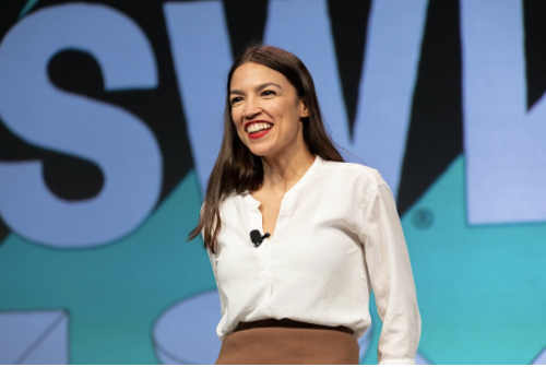Congresswoman Alexandria Ocasio-Cortez wears her signature bold lip at “South by Southwest” 2019. In her collaboration with Vogue AOC goes over why she chooses to wear this red along with her daily make-up routine and the treatment of women in politics. 