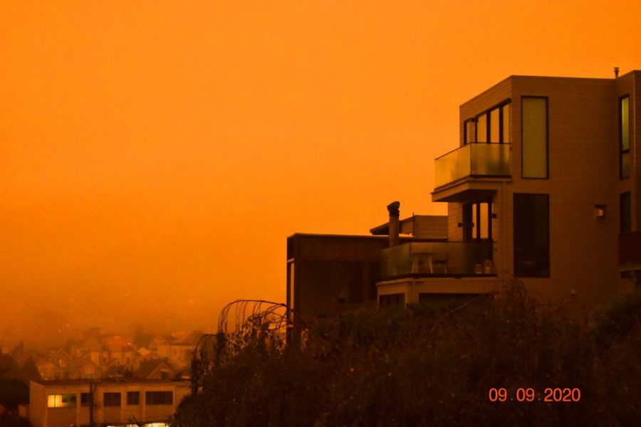 An eerie darkness and orange light cover Noe Valley at approximately 10 a.m. on Sept. 9. Smoke from fires above a marine layer throughout Northern California caused an unusual lack of light and cooler than normal temperatures.