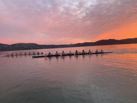 Senior Ella Ghazinouri practices with Marin Rowing Association in Greenbrae during sunset. Ghazinouri is contacting Division-I coaches virtually since the NCAA has banned in-person recruitment.