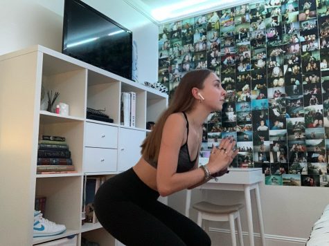 Junior Takouhi Asdorian does squats for her field hockey workout. Every week, the field hockey team meet every Monday for 30 minutes.