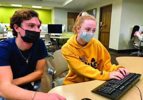 Cece Giarman (19) adjusts to new safety protocols including wearing masks at the University of Notre Dame. Students attended in-person classes after undergoing a two-week quarantine upon arriving on campus in the fall.  