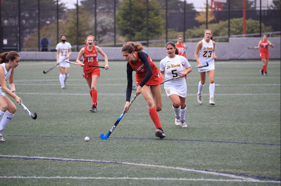 Senior Stella Neuman playing center forward in a game against Lick-Wilmerding on Oct. 20, 2021. Neuman has scored two goals and had a few assists during her four years as a field hockey player.