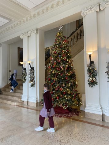 Students in the main hall — where Christmas on Broadway was held. Two Christmas trees is a Broadway tradition, and can be found in the Main Hall. 
