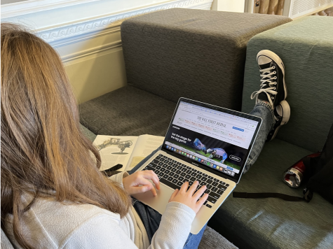 Freshman Ella Patzer accesses The Wall Street Journal during her study block. Students are given access to a variety of platforms such as The New York Times, The Wall Street Journal, Gale, and JSTOR. 