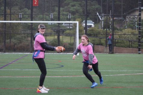 Quarterback and senior Keira Blattberg sets up the ball for senior Audra Dawkins’ punt. This year’s game was the first annual junior-senior flag-football game.

