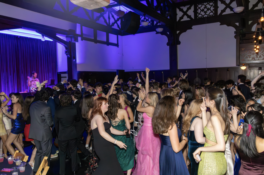 Students dance and have fun at Prom. Prom is an event hosted by the school for juniors and seniors every year.