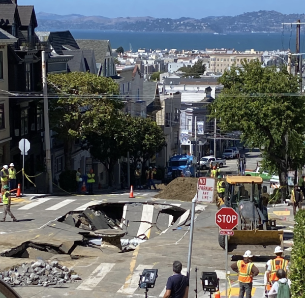 Sinkhole on Union and Green St. interrupted Pacific Heights traffic. Sinkholes occur when water washes away the soil residue and weakens the road above.