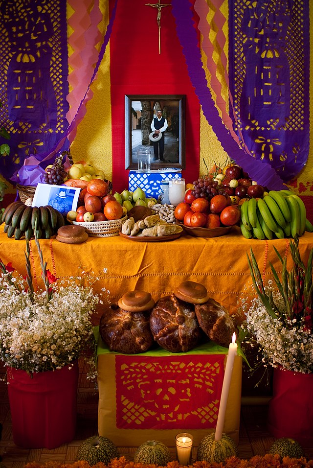 A+traditional+ofrenda+for+Dia+de+los+Muertos%2C+in+Mexico+City.+Ofrendas+are+often+adorned+with+pictures+and+favorite+foods+of+the+deceased.