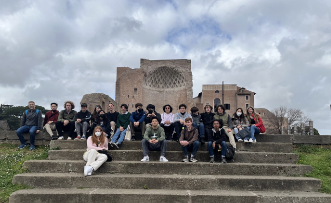 Students sit on the steps at their ancient destination. Even through Covid-19 restrictions, the 2022 Rome trip was still able to appreciate these sites.
