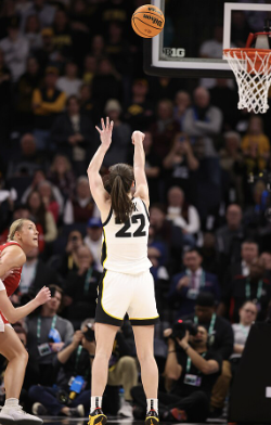 Caitlin Clark shooting a shot during the 2024 Big Ten Tournament finals. Clark was the number one pick for the WNBA draft this year. 