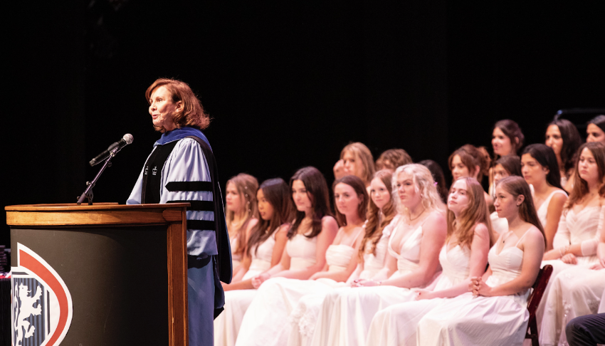 Dr. Krejcarek speaks during the graduation of the class of 2023. The Convent graduates are wearing their traditional white dresses, continuing a custom that was also held for this year’s class.

