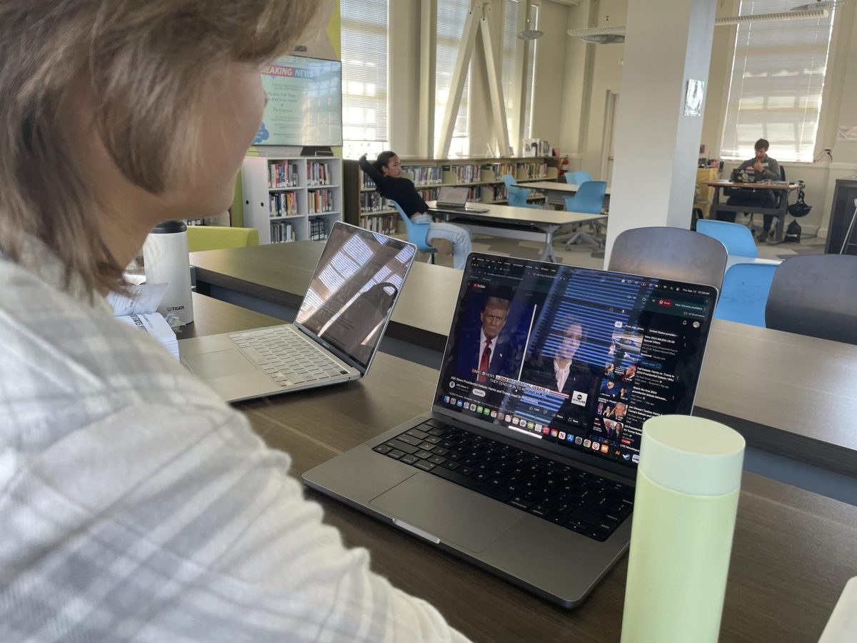 Sophomore Leila Sawicki watches the presidential debate for English homework. Her assignment was to pick up the rhetorical appeals in Harris and Trump’s arguments.