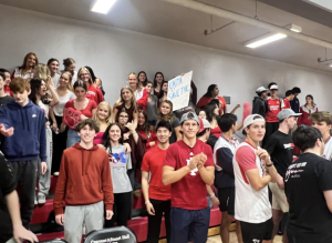 The senior student section cheers after the Cubs win against Summit Tamalpais High School. Senior students usually get priority down on the bleachers closest to the home side of the court, which is a privilege for upperclassmen to get the best view. 