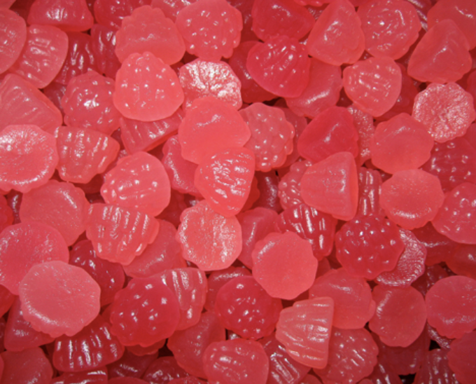 Red Dye No. 3 is known to give certain foods the cherry red color. Most popularly seen in Candy corn, conversation hearts, and PEZ. 
