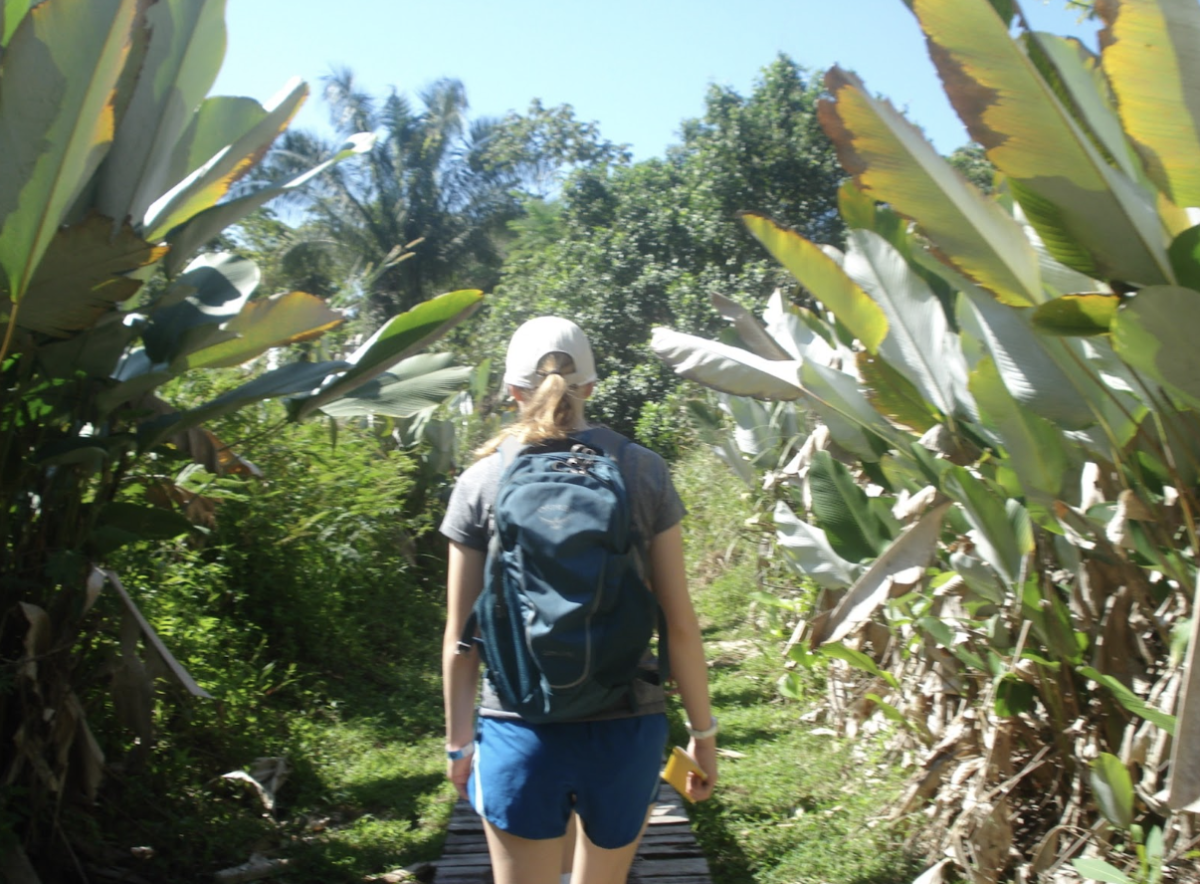 Alexandra Herrmann walks though shrubbery while on an eco-hike at the Hacienda Baru nature reserve. During that hike, students observed a diverse array of plants and animals, such as monkeys, sloths, and wild hogs.

