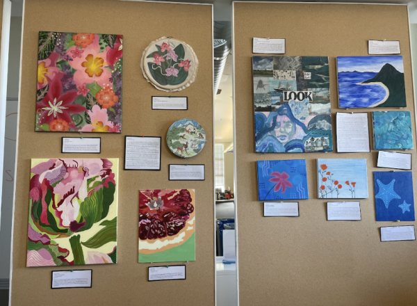 The artists from the Advanced Art Portfolio class were situated in the panel room to share their art. They spent the whole year developing their exhibits and preparing their artwork for the showcase.
