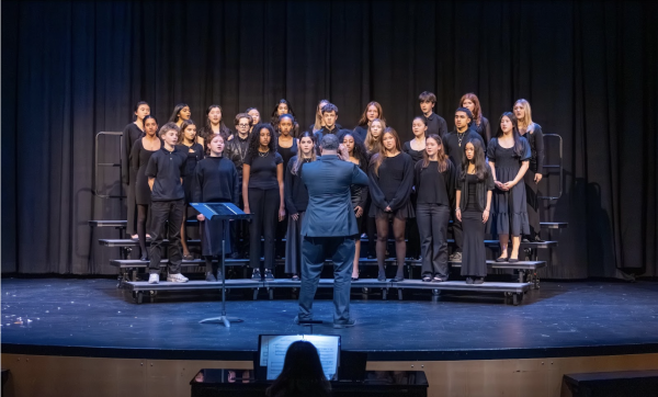 The vocal ensemble sings “Carol of the Bells” at the winter concert. Conducted by performing arts chair Phillip Harris, the ensemble performed alongside instrumentalists and the dance team.