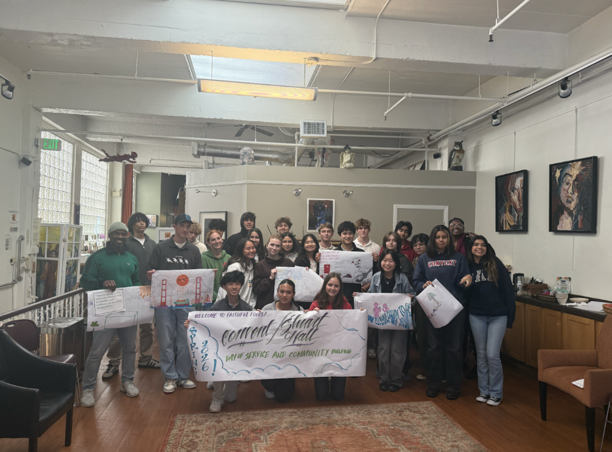 The Faithful Fools service group shows off the posters they made along with the quotes they were modeled off of. This activity merged creativity with impactful messages.